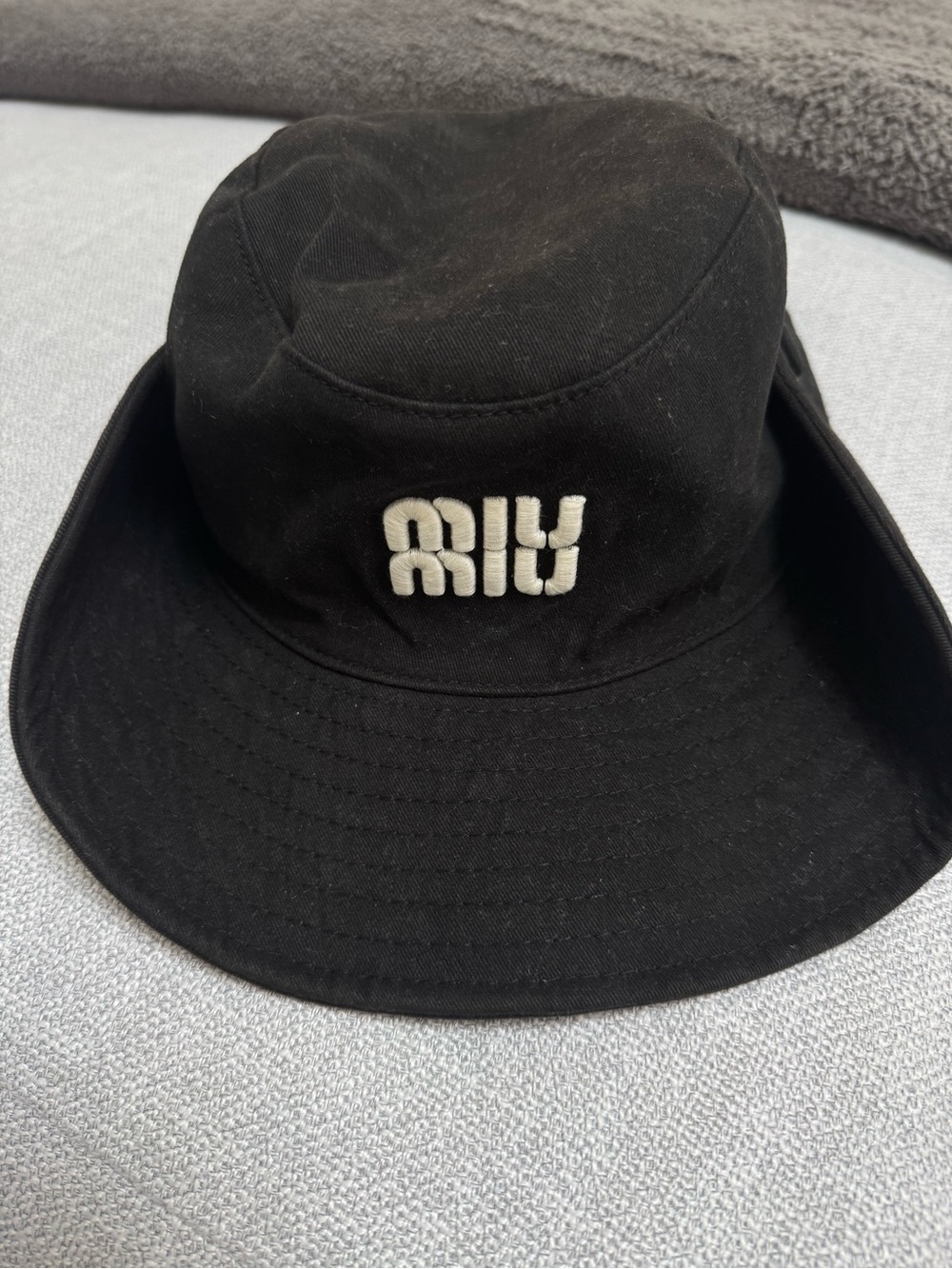 Black Miu Miu Bucket Hat with White Embroidered Logo